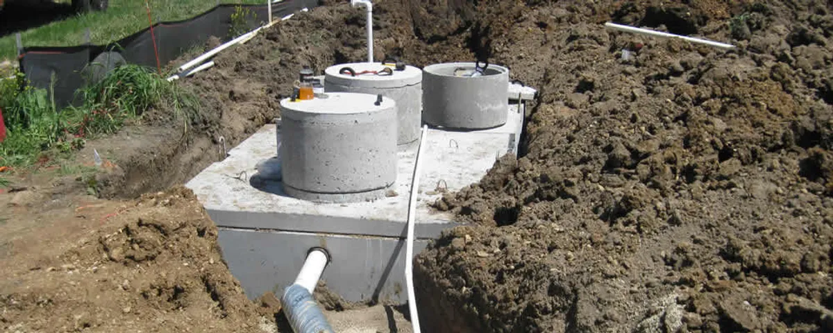 Septic system repair and installation site with tank access ports in Arlington, TX