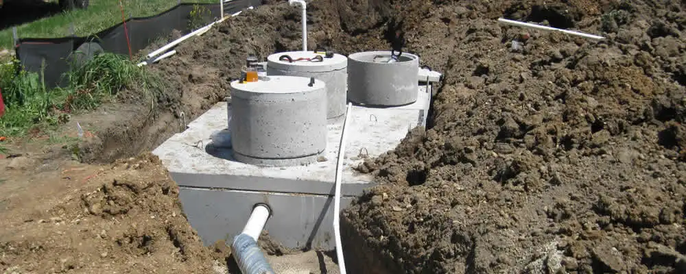 Septic system repair and installation site with tank access ports in Arlington, TX